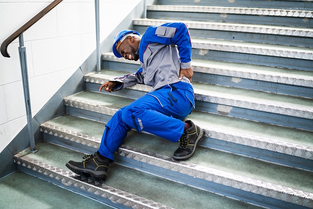 Naples premises liability lawyer helping client with legal claim after injury due to unsafe property conditions.