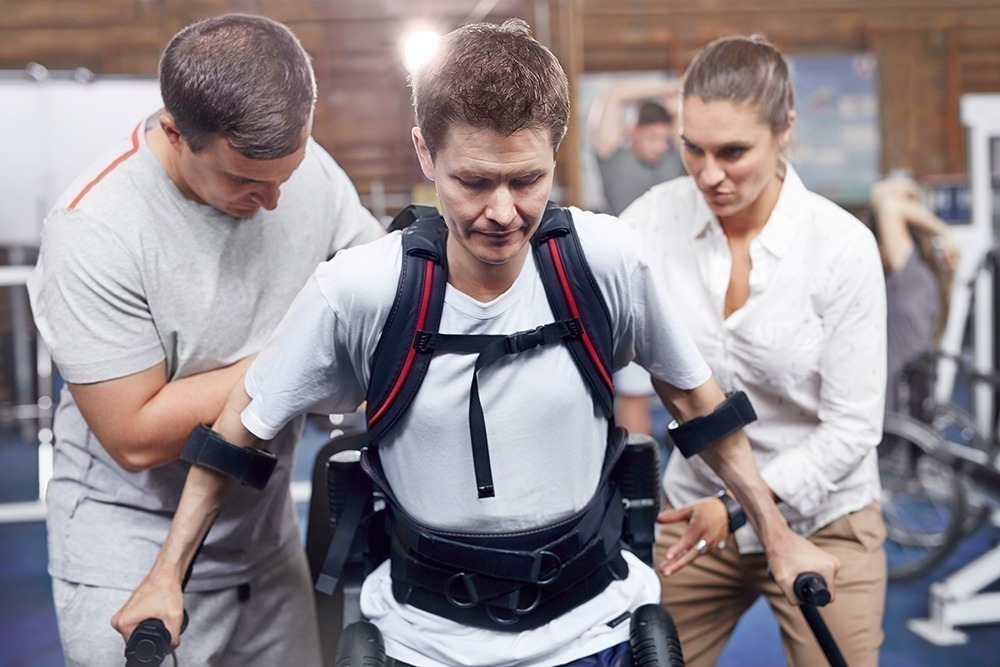 Naples criminal negligence attorney discussing legal action with client after injury caused by reckless conduct.