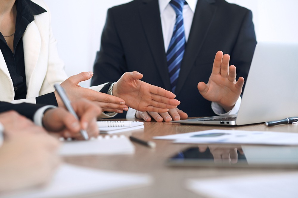 DuFault Law attorneys at a pre-trial conference preparing a personal injury case in Florida