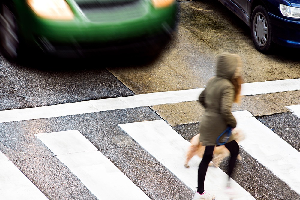 Pedestrian accident scene showing injured person struck by a car – Florida and Georgia pedestrian accident lawyer explains liability and victim compensation.